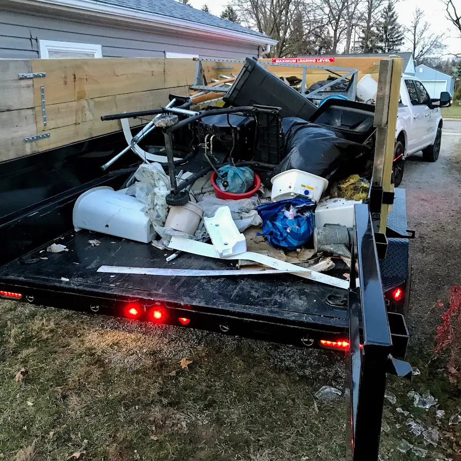 Roll-off dumpster delivered to a residential driveway in Merrydale